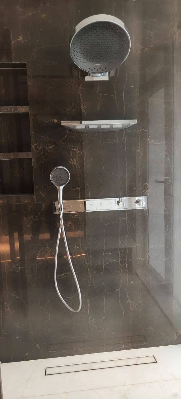 Homeowner reviewing a high water bill caused by a hidden leak in San Jacinto, CA